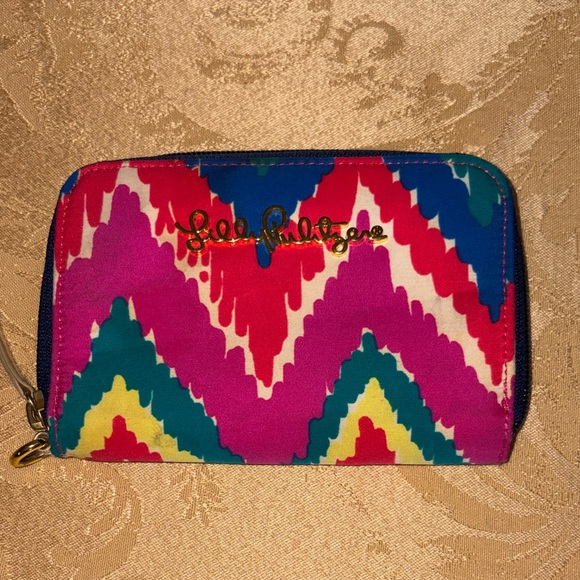 Lilly Pulitzer Handbags - Lilly Pulitzer Vibrant Chevron Zip Wallet in Pink, Blue, Green & Yellow